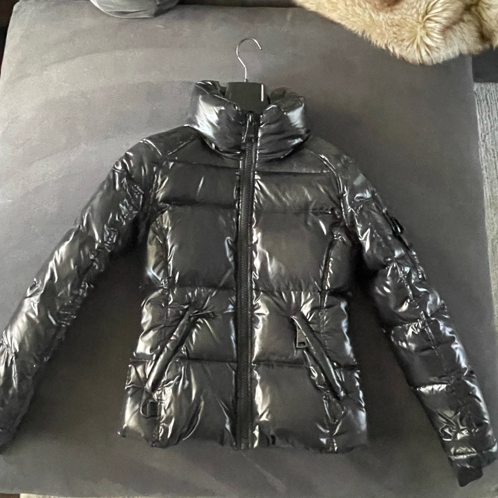 Black Sam. Freestyle down puffer jacket. Sz small. Tiny tear that can be sown.